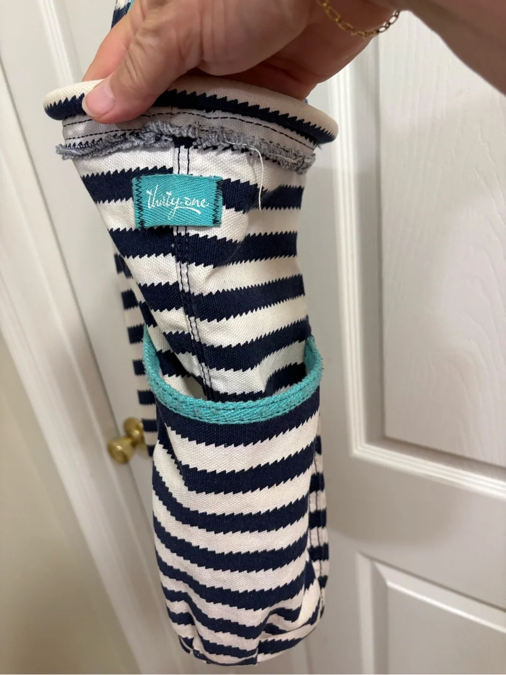 navy and white striped Thirty-One Retro Metro Canvas Tote Bag with teal straps
